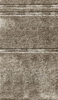 Vertical background texture on a rough concrete grey surface with horizontal indented stripes