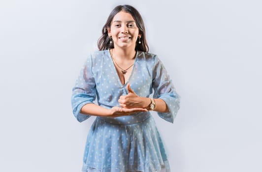 Girl gesturing help with hands in sign language. Person showing help gesture with hands in sign language