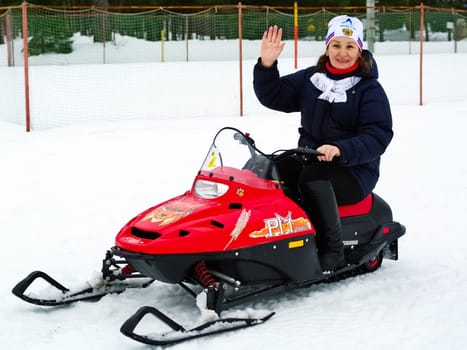 Riding Riding a snowmobile. The means to move the snow in winter