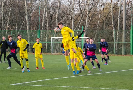 Russia, Volgodonsk - may 17, 2015: Football game. Training matches junior teams and fans