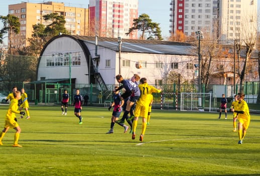 Russia, Volgodonsk - may 17, 2015: Football game. Training matches junior teams and fans