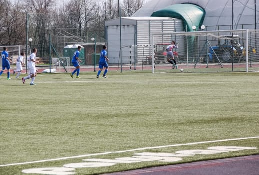 Russia, Volgodonsk - may 17, 2015: Football game. Training matches junior teams and fans