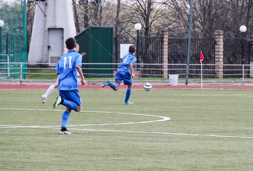 Russia, Volgodonsk - may 17, 2015: Football game. Training matches junior teams and fans