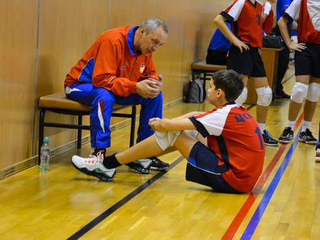 Coach talking to his team. Volleyball.