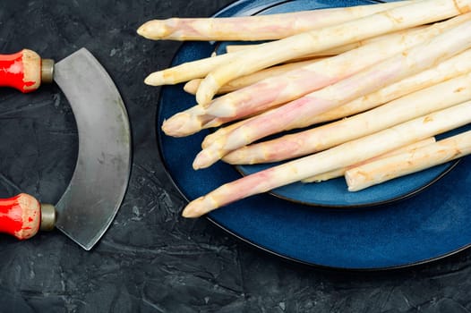Bunch of uncooked fresh white asparagus. Seasonal spring vegetable for healthy food.