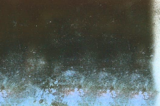 Rough grunge-style surface with spots and streaks on the surface