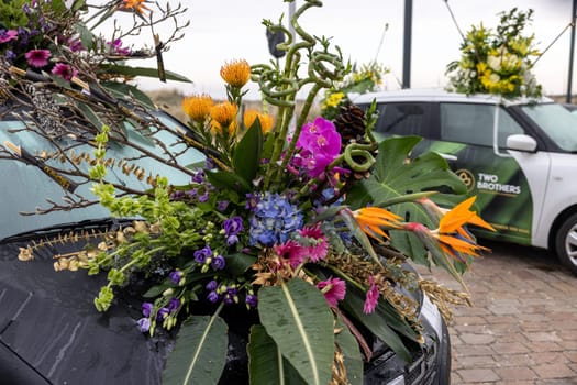 Noordwijk, Netherlands - April 22, 2023: Cars decorated with flowers taking part in the Bloemencorso Bollenstreek the annual spring flower parade from Noordwijk to Haarlem in the Netherlands.