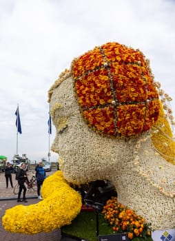 Noordwijk, Netherlands - April 22, 2023: Spectacular flower covered floats in the Bloemencorso Bollenstreek the annual spring flower parade from Noordwijk to Haarlem in the Netherlands.