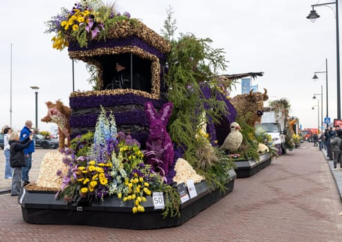 Noordwijk, Netherlands - April 22, 2023: Spectacular flower covered floats in the Bloemencorso Bollenstreek the annual spring flower parade from Noordwijk to Haarlem in the Netherlands.