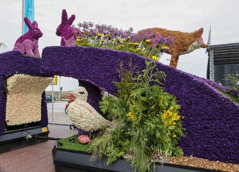 Noordwijk, Netherlands - April 22, 2023: Spectacular flower covered floats in the Bloemencorso Bollenstreek the annual spring flower parade from Noordwijk to Haarlem in the Netherlands.