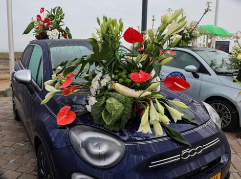 Noordwijk, Netherlands - April 22, 2023: Cars decorated with flowers taking part in the Bloemencorso Bollenstreek the annual spring flower parade from Noordwijk to Haarlem in the Netherlands.