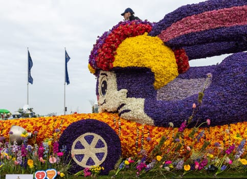 Noordwijk, Netherlands - April 22, 2023: Spectacular flower covered floats in the Bloemencorso Bollenstreek the annual spring flower parade from Noordwijk to Haarlem in the Netherlands.
