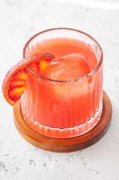 Sanguinello Cocktail garnished with blood orange wheel