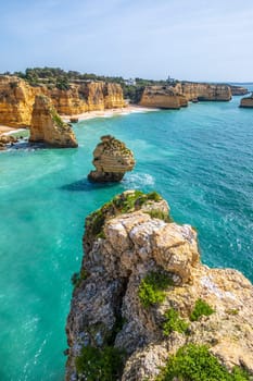 Vertical photography of spectacular cliffs near Marinha beach and Benagil in Algarve, Portugal