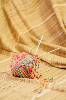 Balls of colored yarn for knitting. Selective focus with shallow depth of field.
