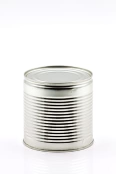 Cylindrical tin can for the food industry.Selective focus with shallow depth of field.