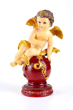 Miniature figurine of a cherub /angel/. To decorate religious holidays.