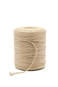 A spool of natural cotton twine with a wide range of applications. Selective focus with shallow depth of field.
