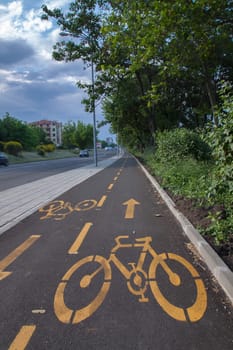 Newly built city bike lane, for the safe travel of cyclists. Selective focus with shallow depth of field.