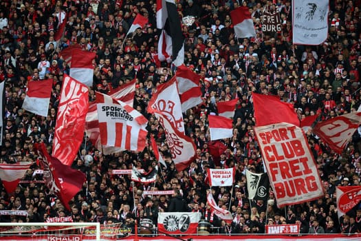 Flags and fans - the atmosphere in the Freiburg fan curve is right from the kick-off at the match of the 1st FBL: 23-24: 30. Sptg. SC Freiburg - FSV Mainz 05  DFL REGULATIONS PROHIBIT ANY USE OF PHOTOGRAPHS AS IMAGE SEQUENCES AND/OR QUASI-VIDEONann  Photo: Joachim Hahne/johapress