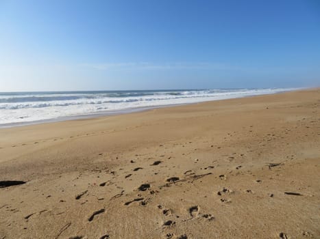 beautiful beach with the sea and its heat waves sun sky water salt air