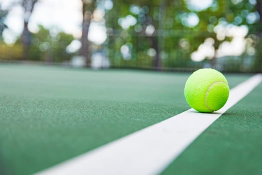 Tennis ball on the court with copy space for your text