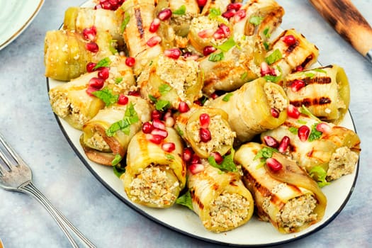 Georgian eggplant rolls with walnut and meat filling, badrijani.