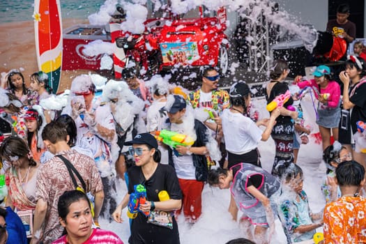 Siam Square, Bangkok, Thailand - APR 13, 2024 Songkran Festival, The short action of people joins celebrations of the Thai New Year or Songkran in Siam Square Bangkok, Thailand.