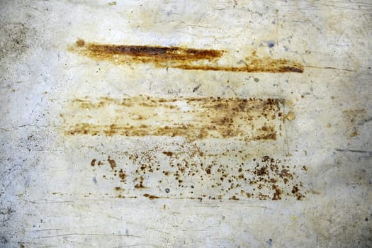 Detail of a rough and rusty metal plate due to the passage of time