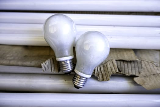 Detail of broken and damaged light bulbs, recycling