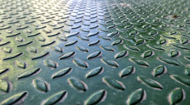Detail of old metal manhole cover