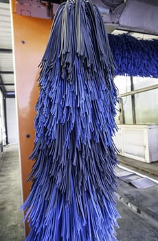 Detail of a car wash in the city, vehicle cleaning