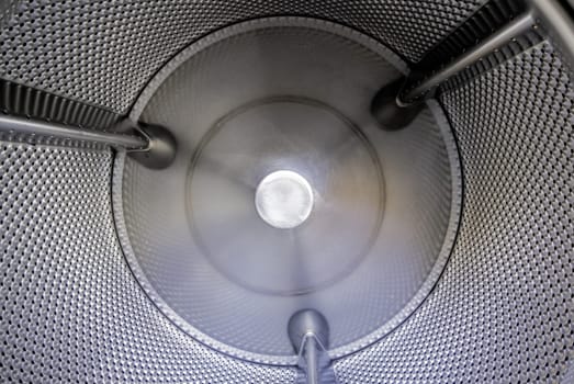 Interior detail of industrial washing machine, hygiene and cleaning