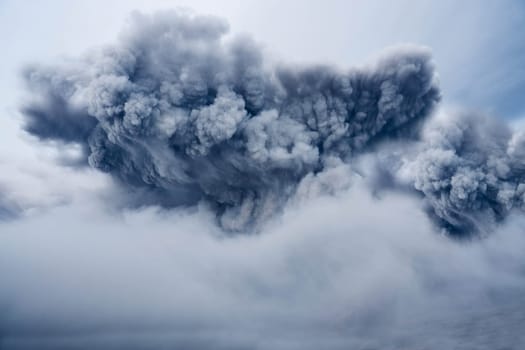 A rising cloud of gray volcanic smoke. Texture or background