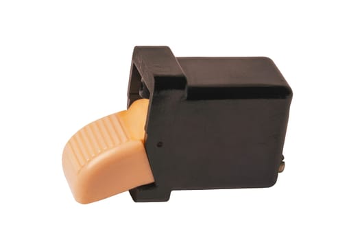 Vintage spare parts for cars. Close-up of a four-pole ivory-coloured button switch from the production of vehicle electrics in GDR times. Clipping path. Around 1960.