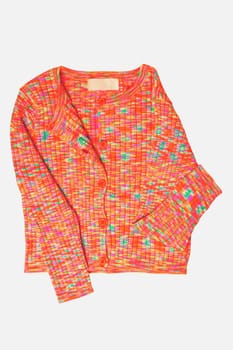 Girls clothes. Multi-colored knitted elegant fluffy cardigan or jumper with v-neck and button closure isolated. Clipping path. Kids and children's fashion.