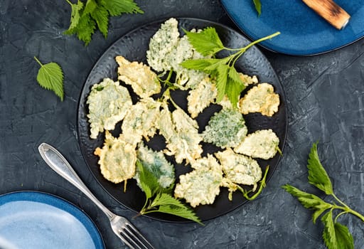 Breaded nettle or battered nettle. Hot spring greens appetizer