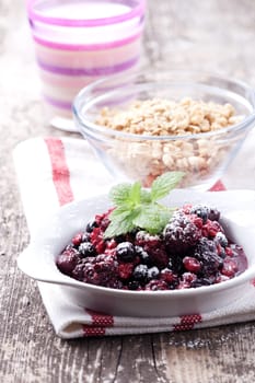 closeup of breakfast cereals with fruits and yoghurt