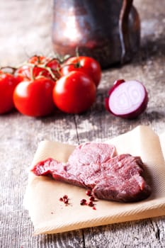 raw steak and pepper corns