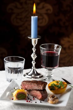 steak with grilled potato on a plate