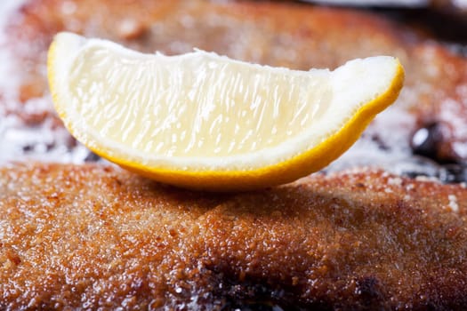 wiener schnitzel in an iron pan