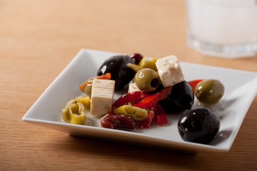 closeup of mixed antipasti with rosemary