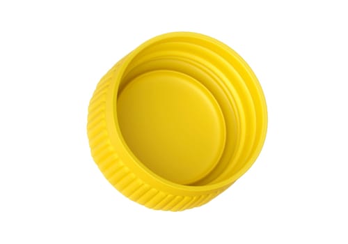Yellow plastic bottle caps isolated on white background