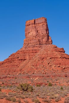 Massive Butte Rising Out of the Red Rock Desert in the Valley of the Gods in Utah
