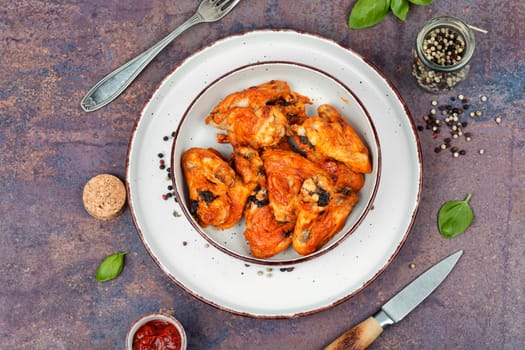Barbecue chicken wings with sauce bbq.