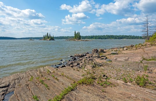 Rocky Shore on a Windblown Lake at Paint Lake Provincial Park in Mantoba