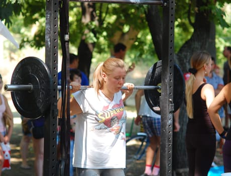 Russia, Volgodonsk - may 17, 2015: Training over the bar. Weight lifting exercise with weights