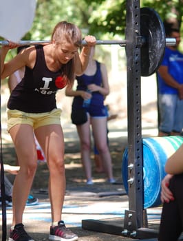 Russia, Volgodonsk - may 17, 2015: Training over the bar. Weight lifting exercise with weights