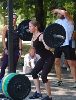 Russia, Volgodonsk - may 17, 2015: Training over the bar. Weight lifting exercise with weights