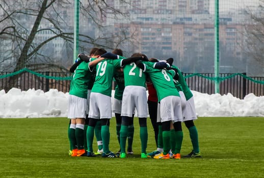 Russia, Volgodonsk - may 17, 2015: Football game. Training matches junior teams and fans